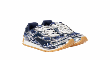 Navy blue and silver mesh sneakers with a futuristic design, featuring a sleek metallic finish and a gum sole for a sporty look.