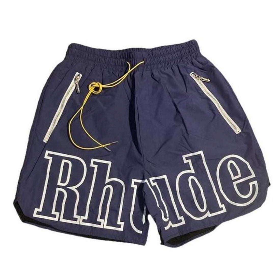 Navy blue Rhude shorts with white outlined logo across the front, yellow drawstrings, and silver zippered pockets on both sides.