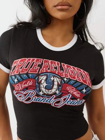 Woman wearing a fitted black ringer crop top with white trim and a bold “True Religion World Wide Brand Jeans” graphic in red, blue, and white.
